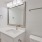 a bathroom with a mirror and sink