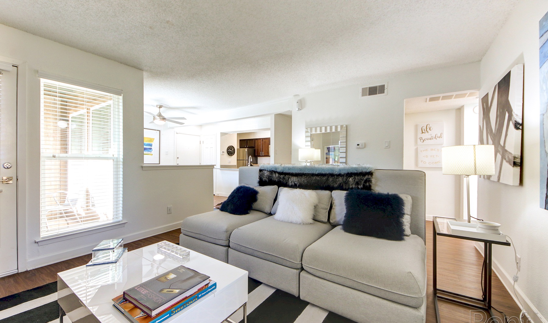Warm Lighting Envelops you inside the Living Room Charming Living Area With Natural Light