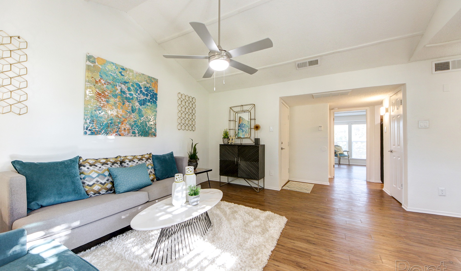 Living Room with Hardwood Floors and Ceiling Fan