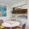 a kitchen with a table and chairs