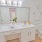 a bathroom with a tub sink and toilet