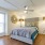 Bedroom with natural lighting and high ceilings
