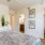 Bedroom with natural lighting and high ceilings