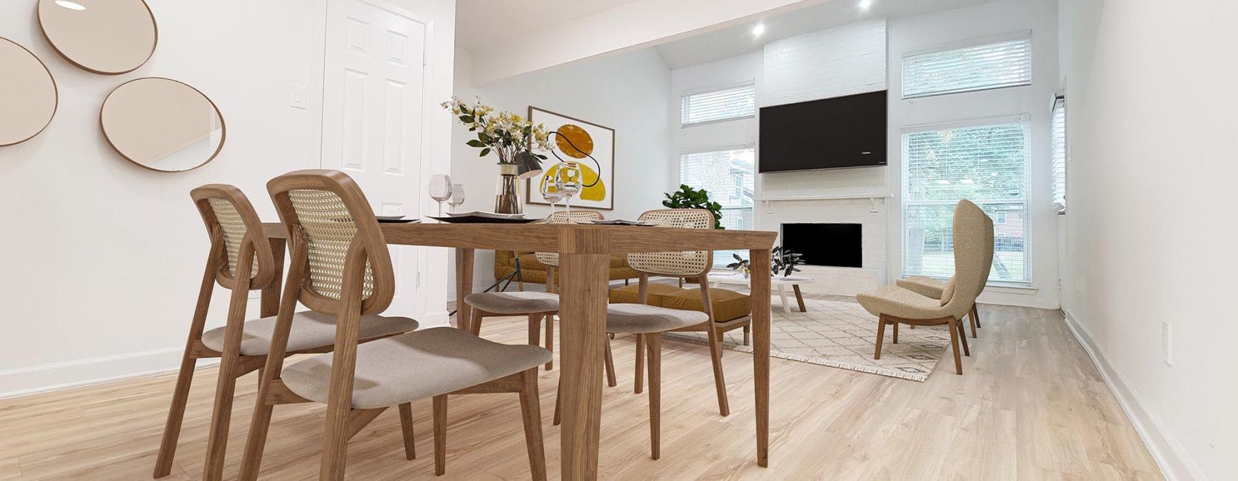 a dining room with a table and chairs