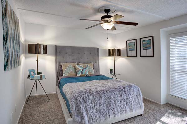 Secondary bedroom with overhead fan/ lighting